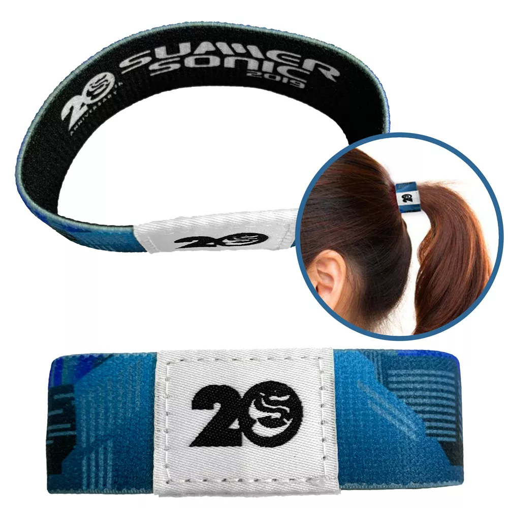 Haarelastiek & Polsband-in-1 met geweven label